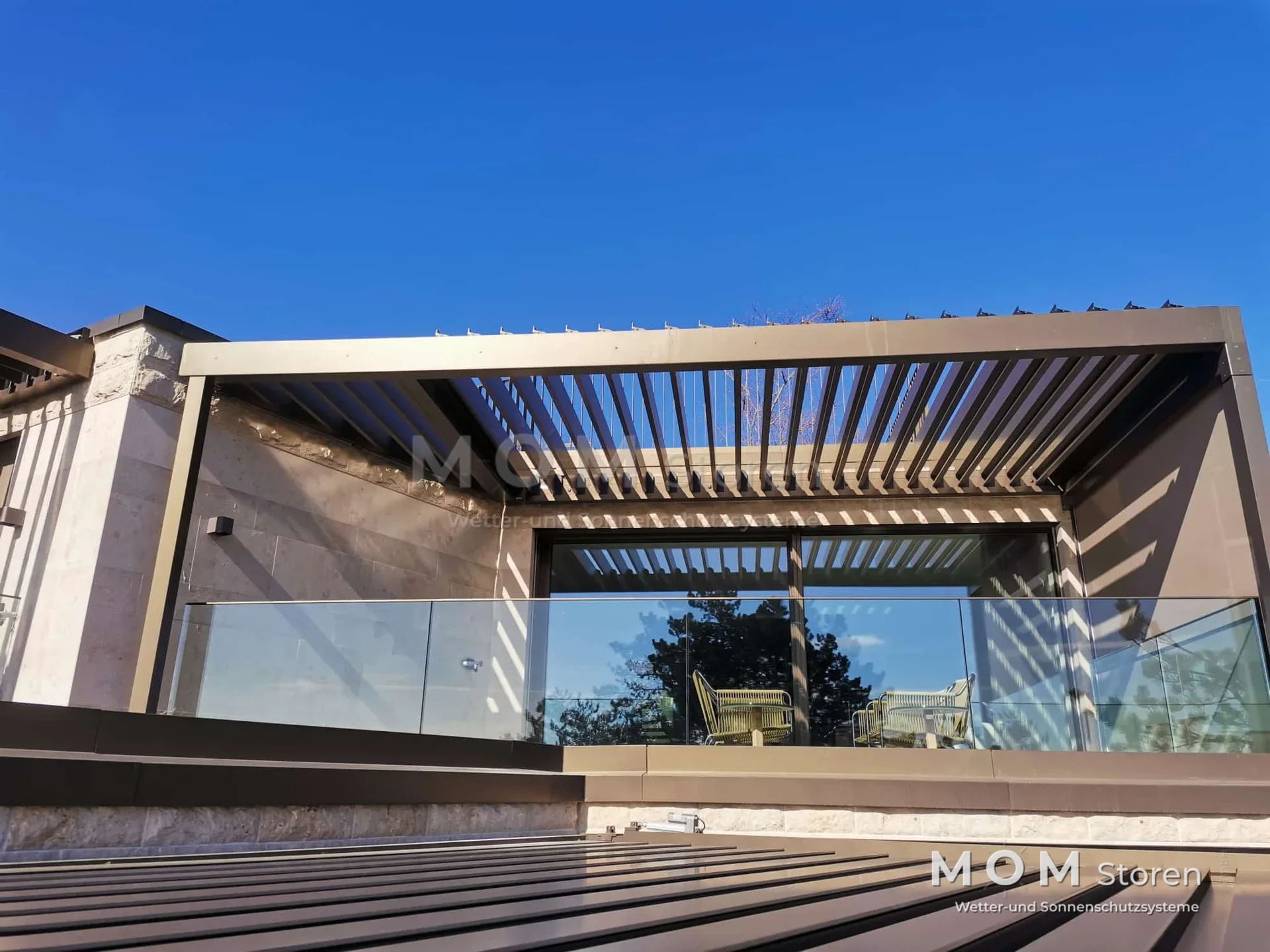 Louvred roof with a glass balustrade